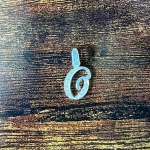 Letter O pendant, silver.